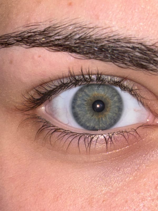 Woman takes mirror selfies and eye close-ups in Bulgaria