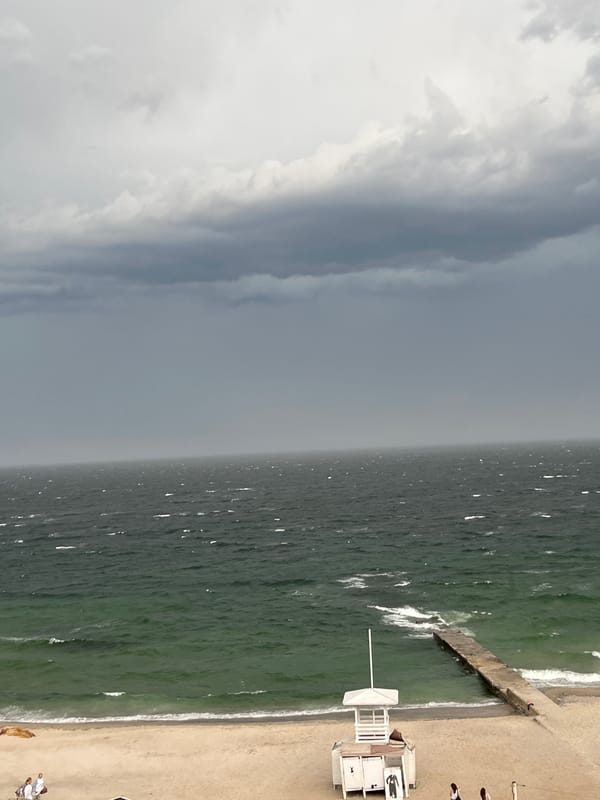 Storm clouds gather over coastal and inland areas
