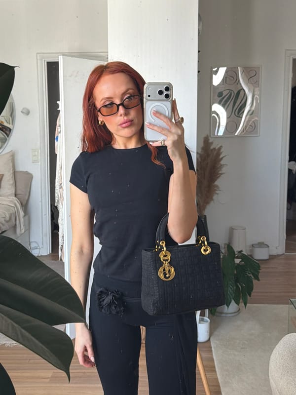 Woman takes mirror selfies in Parisian apartment