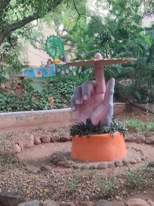 Religious statues and garden scenes documented in Puttaparthi