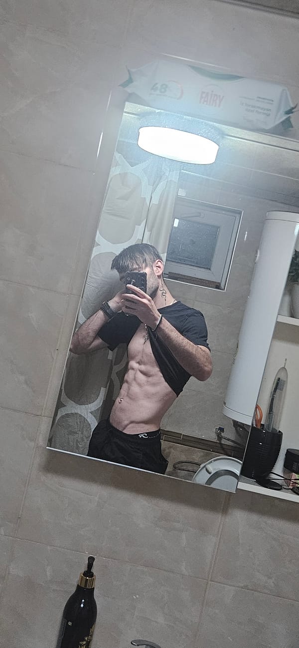Man takes bathroom mirror selfies in Kostenets, Bulgaria