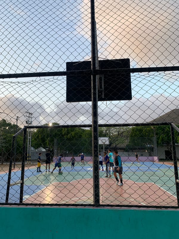 Evening street life and youth sports captured in Santa Ana, Venezuela