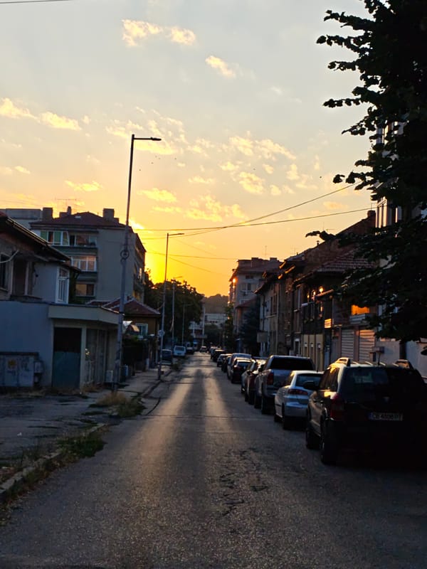Sunset streets and parked cars in Lovech, Bulgaria