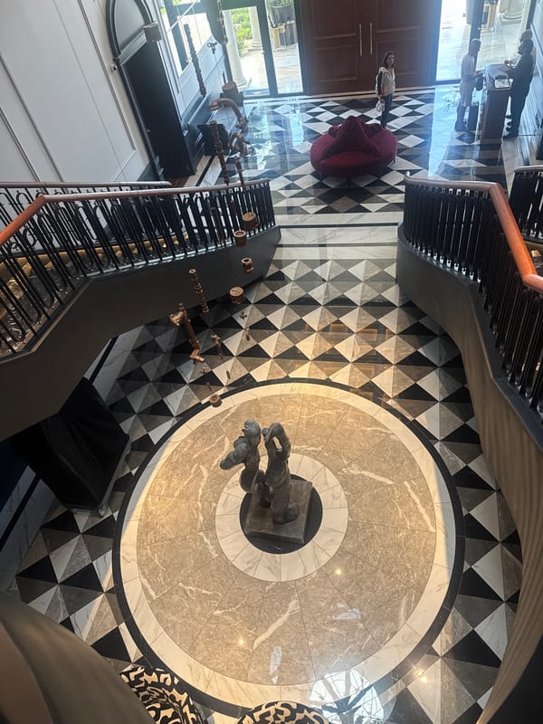 Luxury building interior with stone sculpture documented in Vila Verde