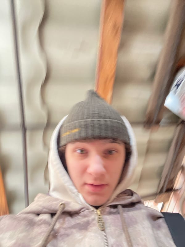 Person takes rotated selfie indoors in Krasnoyarsk, Russia