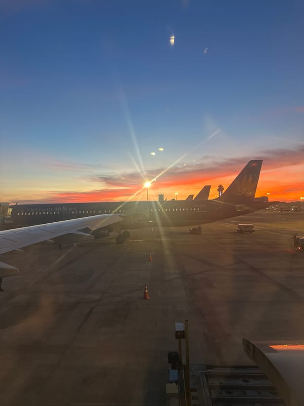 Vivid sunset colors over Thuận An airport tarmac