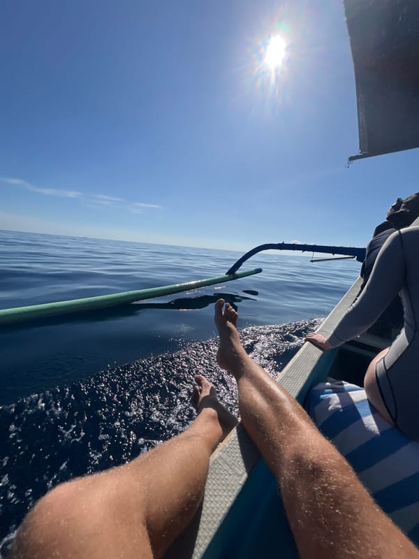 People spotted relaxing on boat near Seririt, Indonesia