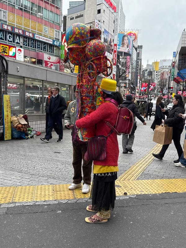 Morning street scene captured in bustling Shibuya district