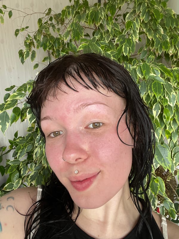 Person takes mirror selfies with wet hair in Zhigalki