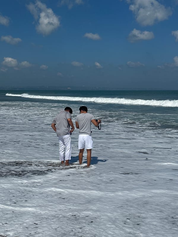 Morning beach life across Kuta's shores and vendors