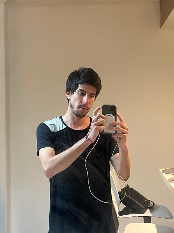 Man documents Buenos Aires visit with selfie, architecture photos