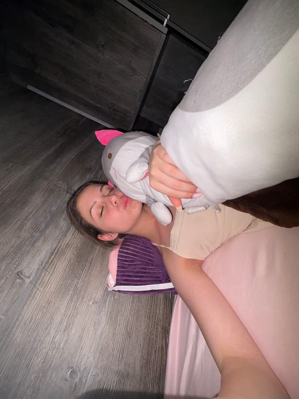 Woman photographed resting indoors during evening in Bulgarovo, Bulgaria