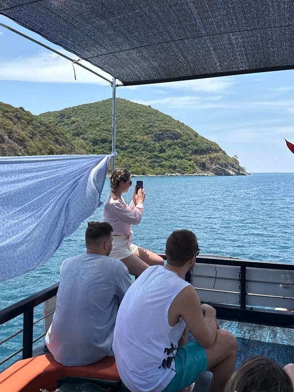 Tourist boat excursion with parasailing off Nha Trang coast