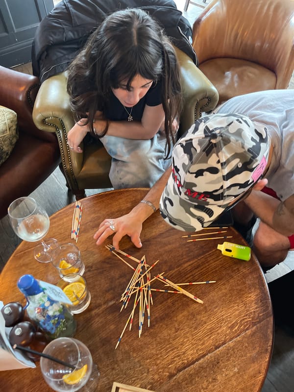 London group plays pick-up sticks game Sunday afternoon