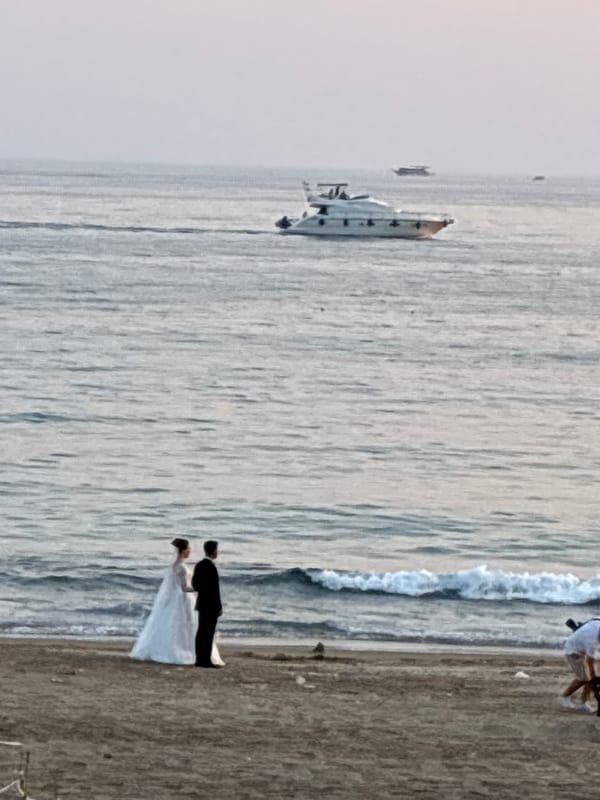 Beach wedding shoot in Alanya at sunset, drone overhead