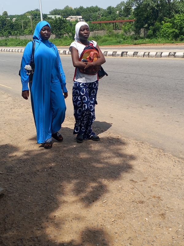 Everyday street life documented across two Nigerian communities Tuesday afternoon