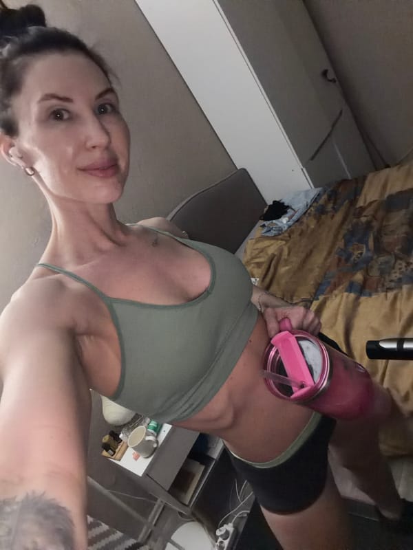 Woman records fitness selfies in bedroom in Perm