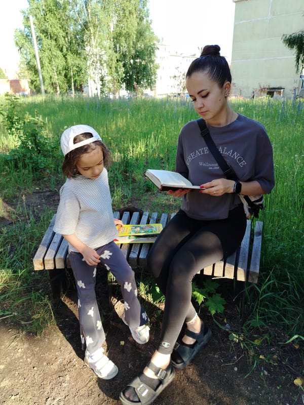 Lazy summer afternoon at a neighborhood playground in Noviy