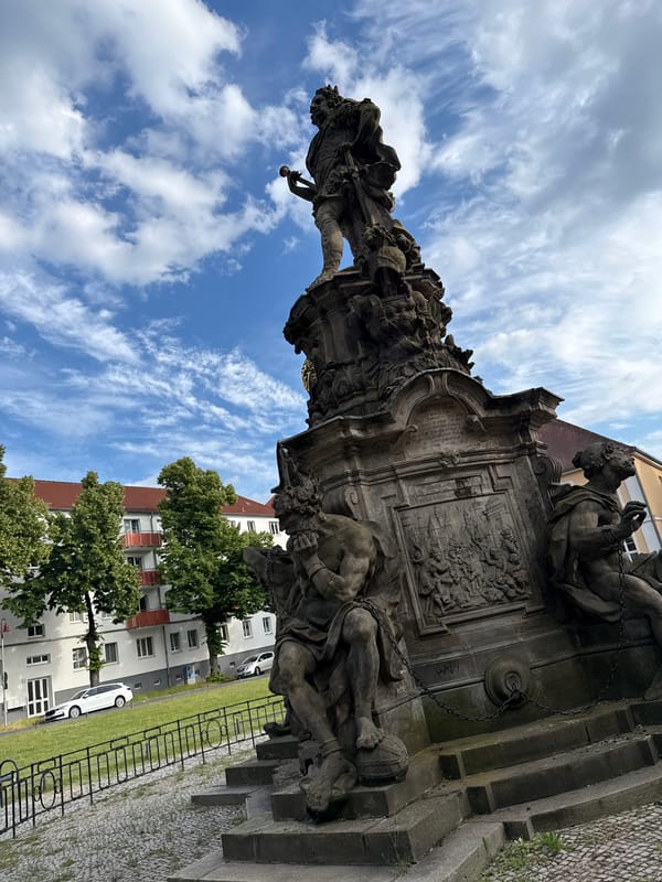 Rathenow canal, monuments, and street scenes on a June afternoon