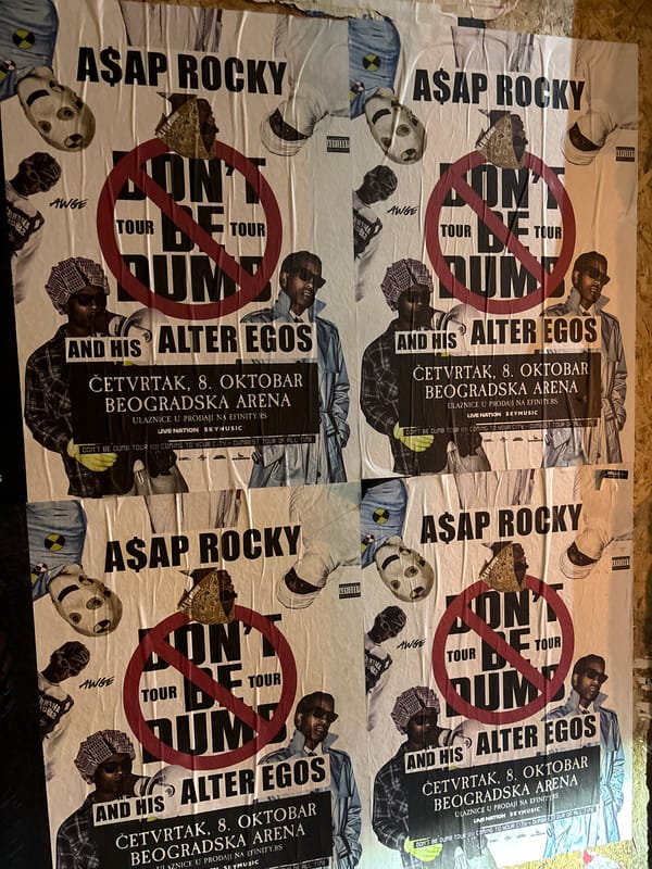 Concert posters and venue signage on Belgrade streets