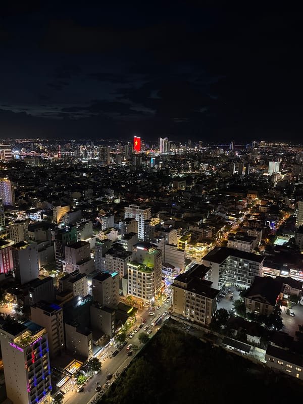 Nighttime aerial views capture bustling Đà Nẵng cityscape activity