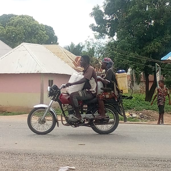 Morning motorcycle traffic captured in Mararaba, Nigeria streets