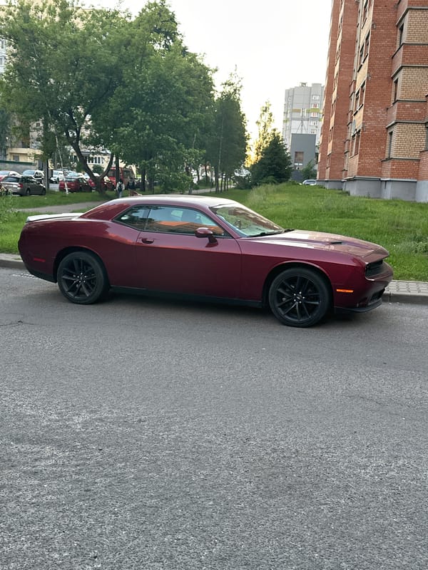 Maroon Dodge Challenger and street scenes documented in Minsk