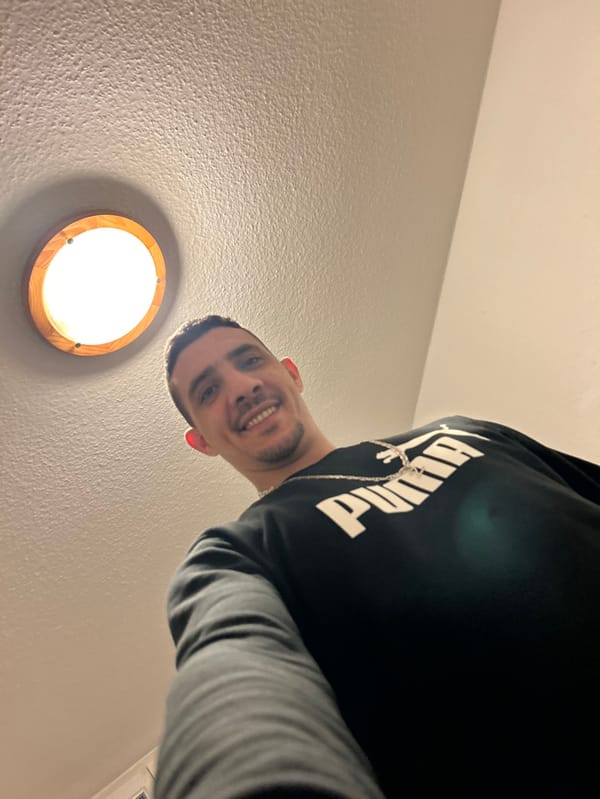 Man documents currency collection and team memorabilia in Bischheim selfies