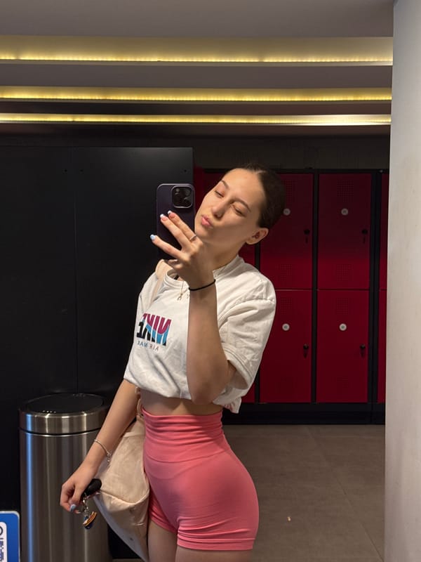 Woman takes selfie in Sofia gym locker room