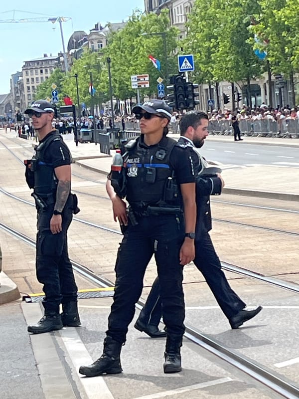 Security forces and brass band assemble for ceremony in Luxembourg City