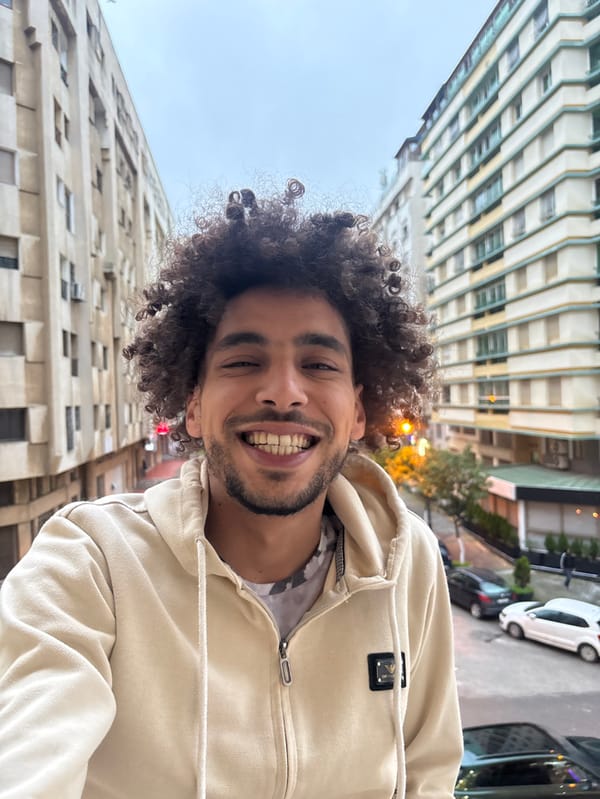 Tourist documents daily life scenes across Tangier, Morocco