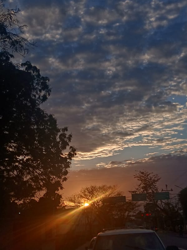 Dramatic sunset with layered clouds observed in Juan Griego