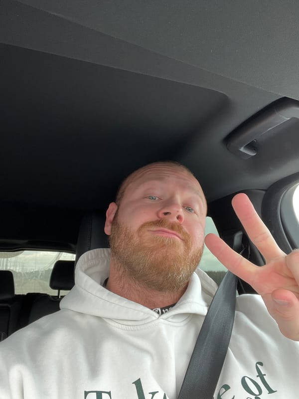 Man Makes Peace Sign Gesture in Vehicle in Noviy