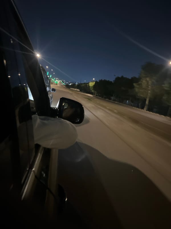 Nighttime driving scene captured in Abuja, Nigeria