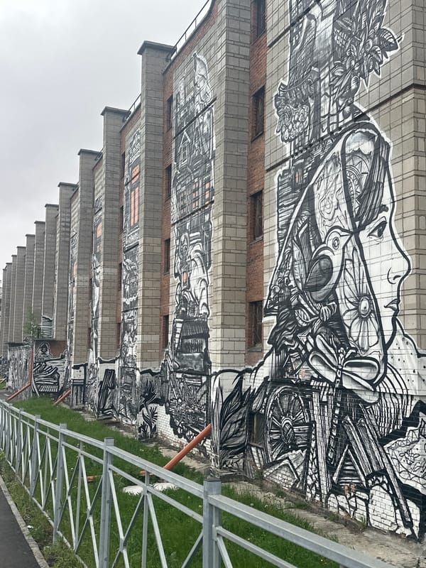 Novosibirsk street scenes captured: tram, architecture, bridge art