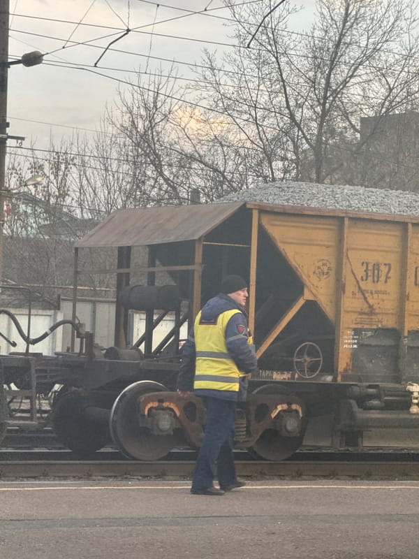 Rail worker inspects hopper car in Gryazi, Russia