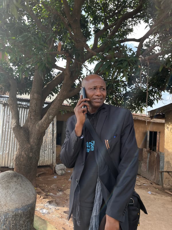Street scene captures phone call, pedestrians in Jos