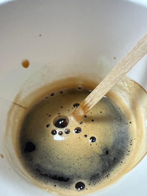 Coffee with wooden stirrer in Aksakovo, Bulgaria