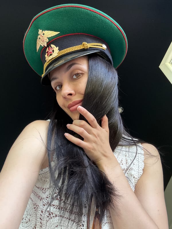 Woman in military cap photographed in Votkinsk, Russia