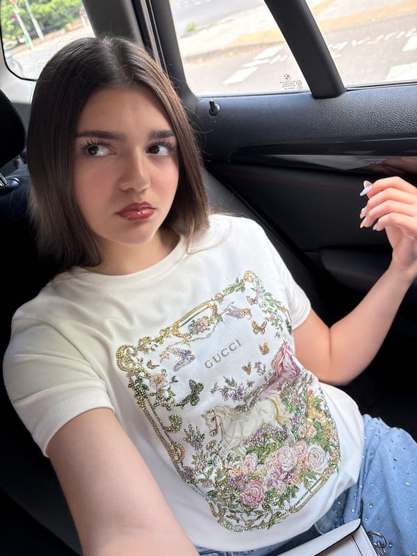Young woman photographed in vehicle during brief morning timespan