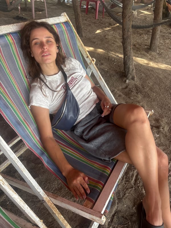 Lazy afternoon at a tarp-shaded beach hangout in Đà Nẵng