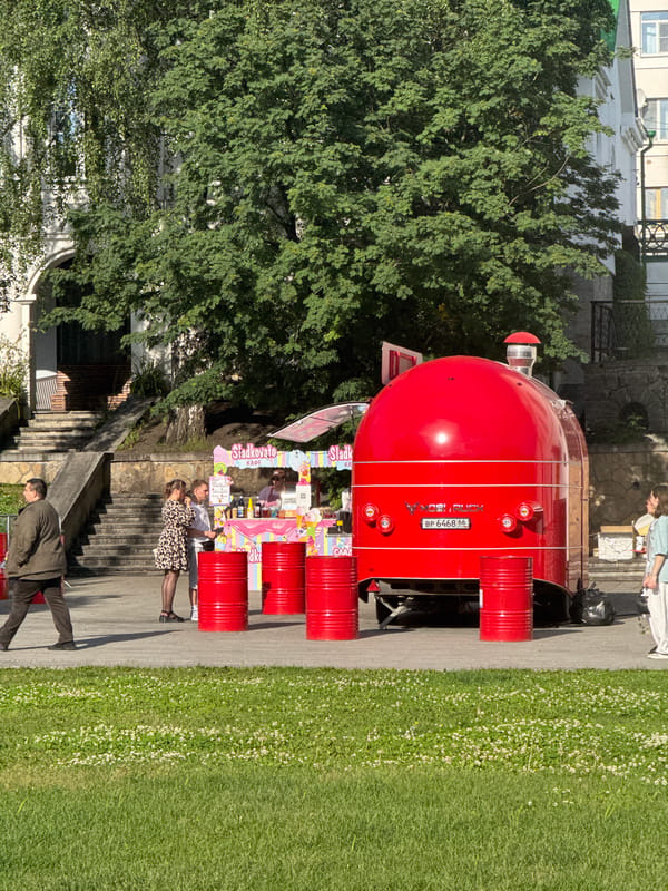 Yekaterinburg riverside in full summer swing — music, murals, and crowds