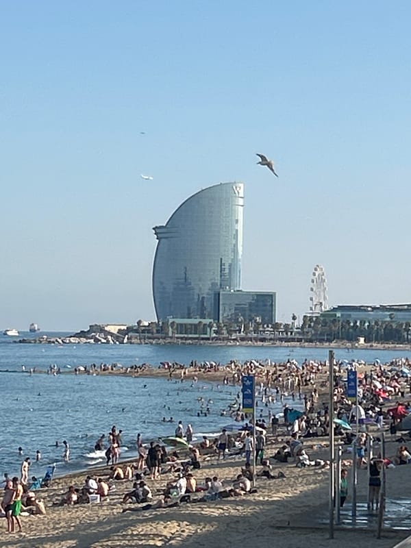 Barceloneta beach buzzing on a sunny June afternoon