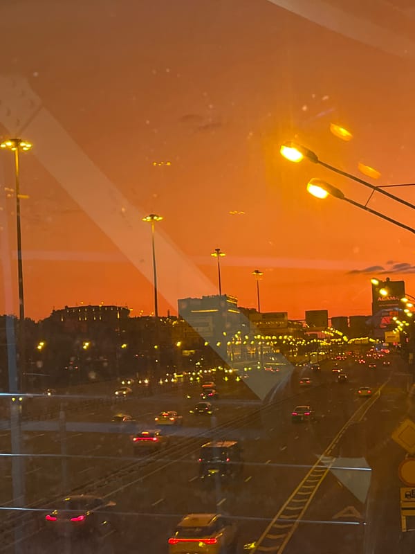 Evening around a Khimki highway bridge, golden hour to night