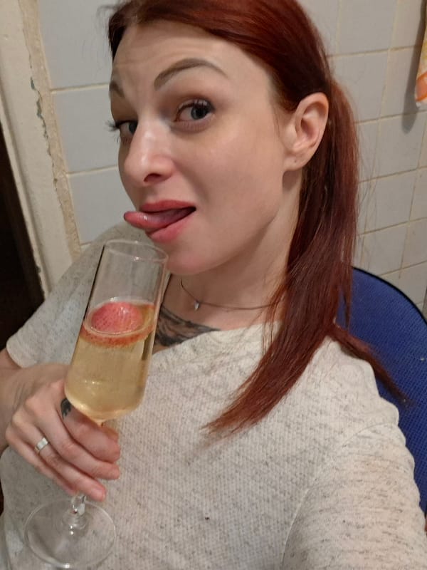 Couple celebrates with champagne, dinner and cats in Belarus