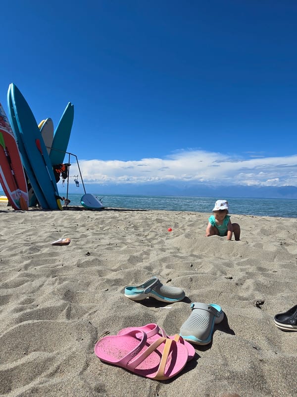 Sunny day at Issyk-Kul's Boz Beshik beach, June 2026