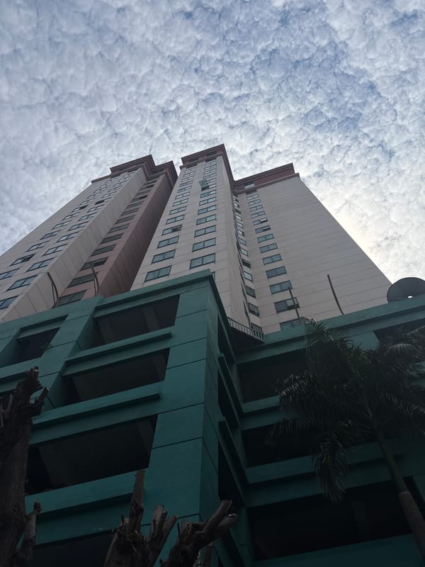 Morning cloud formations observed over West Jakarta buildings