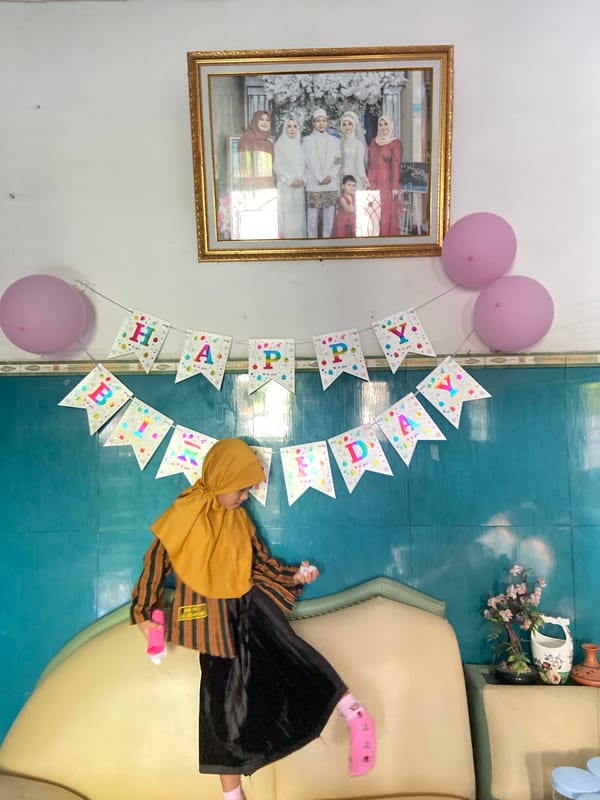 Children's birthday celebration captured in Gelam, Indonesia