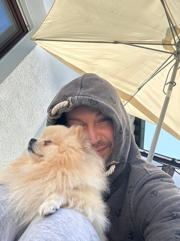 Person and dog enjoy casual outdoor time in Germany