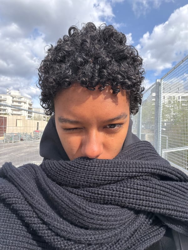 Person in winter clothing photographed in Champs-sur-Marne